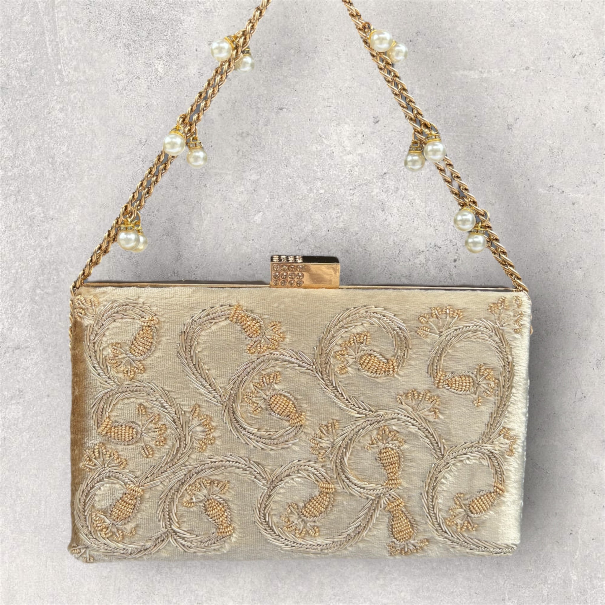 Velvet clutch with dabka work