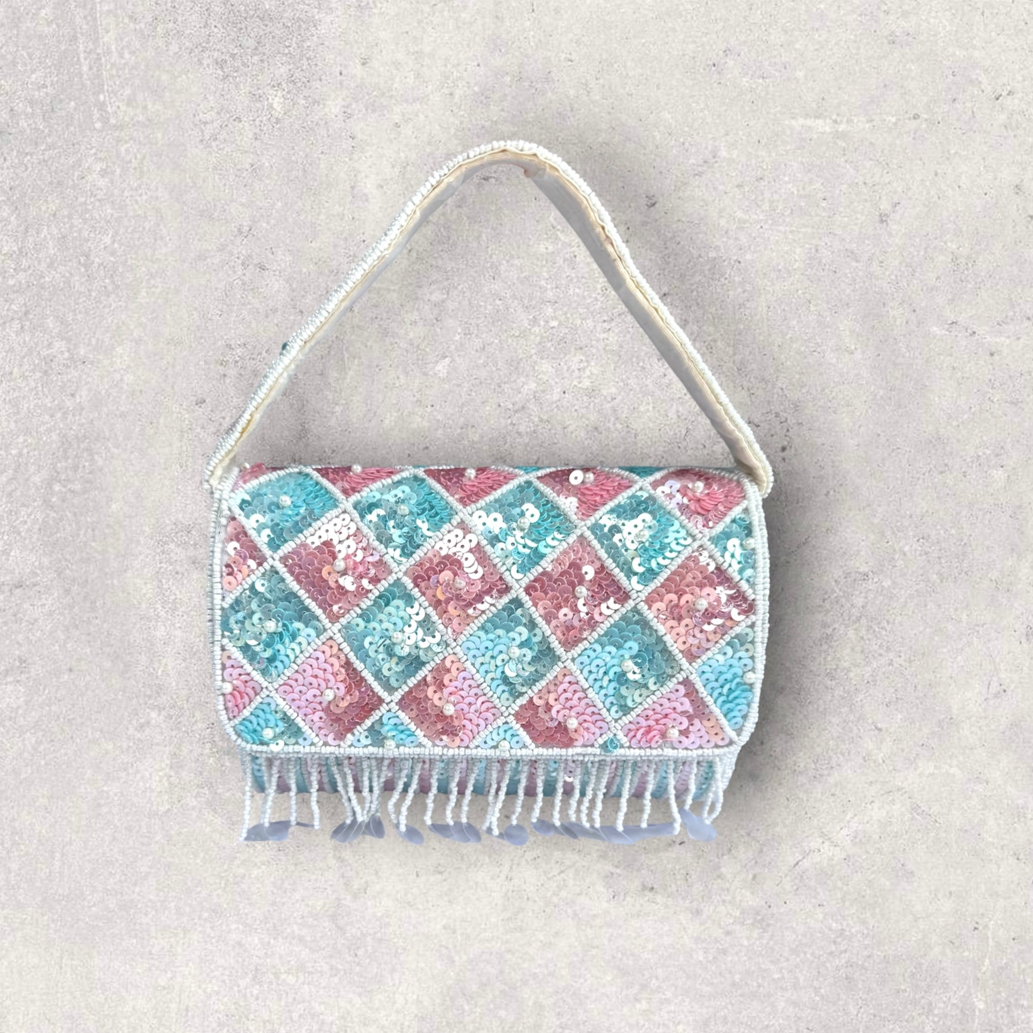 Light pink and blue sequined purse